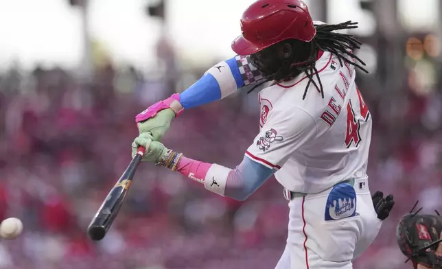 Cincinnati Reds' Elly De La Cruz hits a double in the first inning of a baseball game against the St. Louis Cardinals, Monday, April 28, 2025, in Cincinnati. (AP Photo/Kareem Elgazzar)