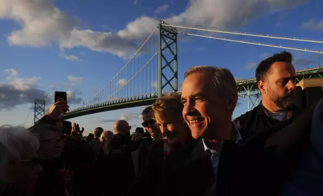 Liberal Leader Mark Carney holds a rally beside the Ambassador Bridge in Windsor, Ontario, Canada, on Saturday, April 26, 2025. (Sean Kilpatrick/The Canadian Press via AP)