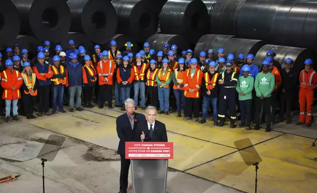 Liberal Leader Mark Carney makes an announcement during a tour of Algoma Steel in Sault Ste. Marie, Ontario on Friday, April 25, 2025. (Sean Kilpatrick /The Canadian Press via AP)