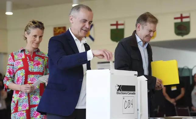 Canada's new Prime Minister and Liberal Leader Mark Carney casts his vote in Ottawa, Ontario, Monday, April 28, 2025. (Sean Kilpatrick/The Canadian Press via AP)