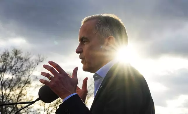 Liberal Leader Mark Carney holds a rally beside the Ambassador Bridge in Windsor, Ontario, on Saturday, April 26, 2025. (Sean Kilpatrick/The Canadian Press via AP)
