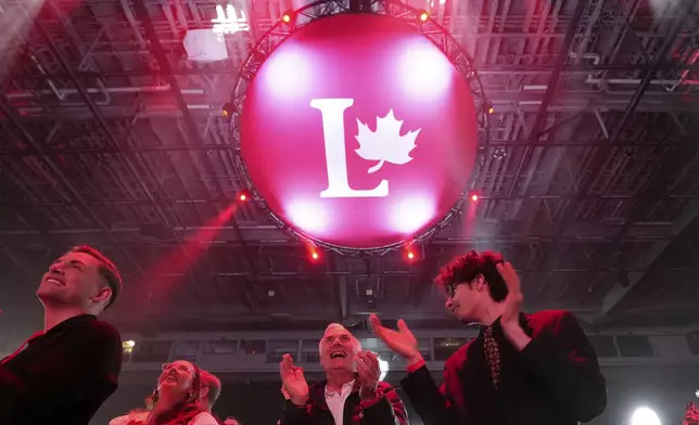 Liberal Party's supporters cheer on results at the party election night headquarters in Ottawa, Monday, April 28, 2025. (Nathan Denette/The Canadian Press via AP)