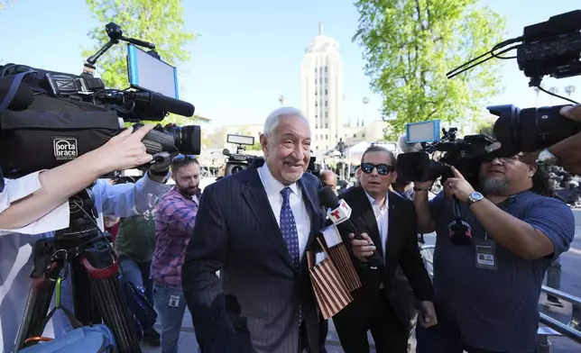 Attorney Mark Geragos arrives for a hearing regarding the case of Erik and Lyle Menendez Friday, April 11, 2025, in Los Angeles. (AP Photo/Damian Dovarganes)