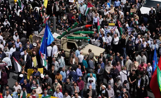 Replicas of some missiles are carried on a truck during an anti-Israel demonstration at the Felestin (Palestine) Sq. in Tehran, Iran, Wednesday, April 9, 2025. (AP Photo/Vahid Salemi)