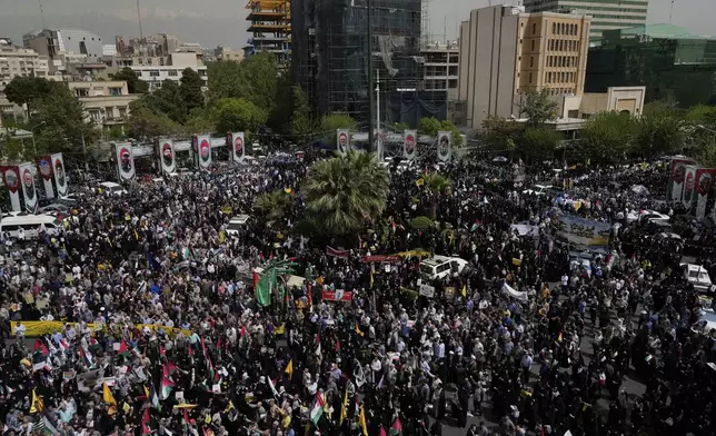 Iranian protesters attend an anti-Israeli demonstration at the Felestin (Palestine) Sq. in Tehran, Iran, Wednesday, April 9, 2025. (AP Photo/Vahid Salemi)