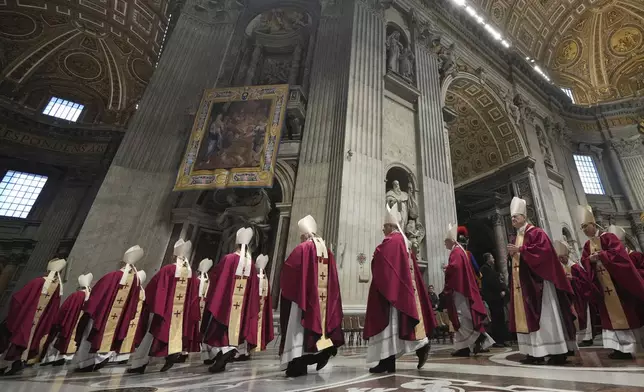FILE - Cardinals leave St. Peter's Basilica after the funeral for late cardinal Angelo Amato in at the Vatican, Thursday, Jan. 2, 2025. (AP Photo/Alessandra Tarantino, File)