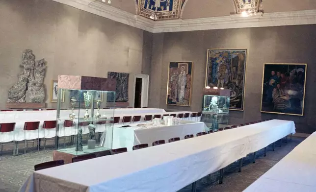 FILE - A view of the Cardinals' tables in the Sistine Chapel in Vatican City, Aug. 25, 1978. The conclave will celebrate Mass here for prayers for inspiration to elect the successor of the late Pope Paul VI. (AP Photo, File)