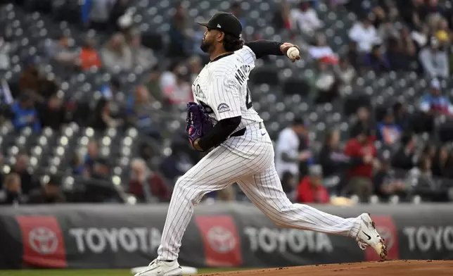 Colorado Rockies starting pitcher Germán Márquez (48) delivers a pitch in the first inning of a baseball game against the Atlanta Braves, Tuesday, April 29, 2025, in Denver. (AP Photo/Geneva Heffernan)