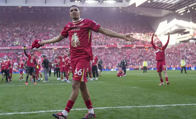 Liverpool's Trent Alexander-Arnold celebrates after winning the English Premier League soccer match between Liverpool and Tottenham Hotspur and clinching the Premier League title at Anfield in Liverpool, England, Sunday, April 27, 2025. (AP Photo/Jon Super)