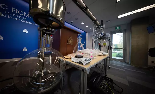 Lab equipment is pictured during Royal Canadian Mounted Police (RCMP) news conference announcing fentanyl production labs that have been dismantled around British Columbia, in Surrey, British Columbia, Thursday, April 10, 2025. (Ethan Cairns/The Canadian Press via AP)