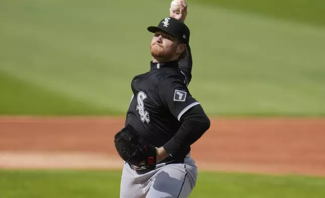 Chicago White Sox's Shane Smith pitches in the first inning of a baseball game against the Cleveland Guardians in Cleveland, Tuesday, April 8, 2025. (AP Photo/Sue Ogrocki)