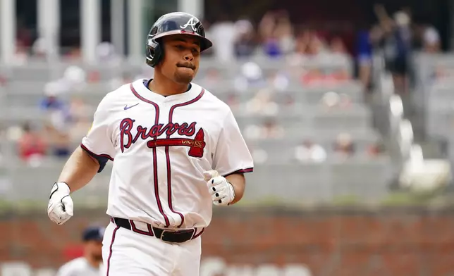Atlanta Braves' Drake Baldwin (30) trots the bases after his two-run home run against the Minnesota Twins during the third inning of a baseball game Saturday, April 20, 2025, in Atlanta. (AP Photo/John David Mercer)