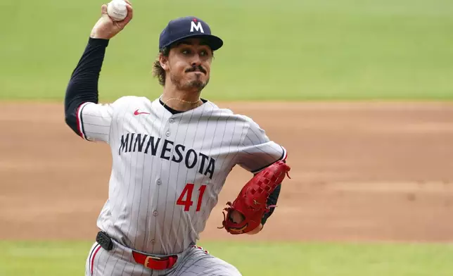 Minnesota Twins pitcher Joe Ryan (41) delivers a pitch against the Atlanta Braves during the first inning of a baseball game Saturday, April 20, 2025, in Atlanta. (AP Photo/John David Mercer)