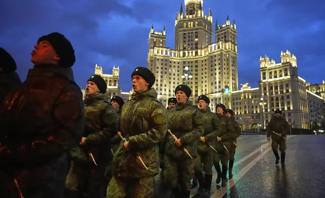 Cossacks march toward Red Square to attend a rehearsal for the Victory Day military parade in Moscow, Russia, on Tuesday, April 29, 2025. (AP Photo/Alexander Zemlianichenko)