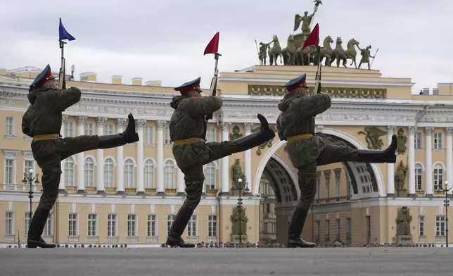 Honour guard soldiers march during a rehearsal for the Victory Day military parade, which will take place at Dvortsovaya (Palace) Square on May 9 to celebrate 80 years after the victory in World War II, in St. Petersburg, Russia, Tuesday, April 22, 2025. (AP Photo/Dmitri Lovetsky)