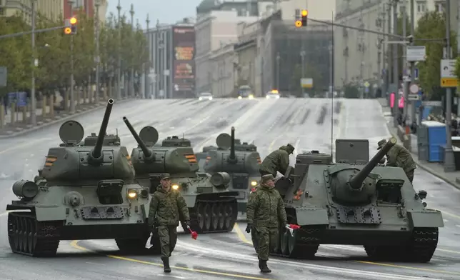 Soviet era T-34 tanks prepare to roll along Tverskaya street to attend a rehearsal for the Victory Day military parade in Moscow, Russia, on Tuesday, April 29, 2025. (AP Photo/Pavel Bednyakov)