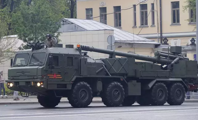 "Malva", a Russian self-propelled gun rolls along a street toward Red Square to attend a rehearsal for the Victory Day military parade in Moscow, Russia, on Tuesday, April 29, 2025. (AP Photo/Alexander Zemlianichenko)