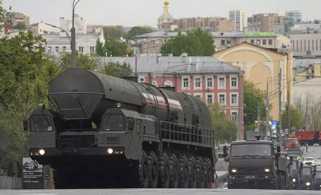 Russian RS-24 Yars ballistic missile launcher rolls along a street toward Red Square to attend a rehearsal for the Victory Day military parade in Moscow, Russia, on Tuesday, April 29, 2025. (AP Photo/Alexander Zemlianichenko)