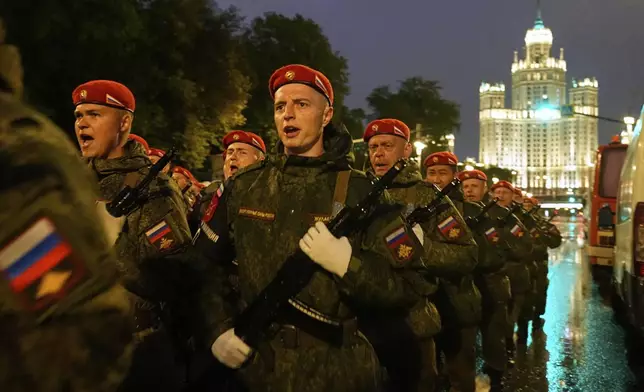 Troops march toward Red Square to attend a rehearsal for the Victory Day military parade in Moscow, Russia, on Tuesday, April 29, 2025. (AP Photo/Alexander Zemlianichenko)