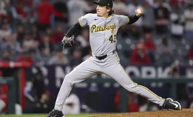 Pittsburgh Pirates pitcher Ryan Borucki (43) throws to a Los Angeles Angels batter during the ninth inning of a baseball game in Anaheim, Calif., Tuesday, April 22, 2025. (AP Photo/Jessie Alcheh)