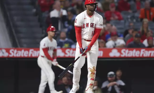 Los Angeles Angels' Jorge Soler looks on after striking out during the eighth inning of a baseball game against the Pittsburgh Pirates in Anaheim, Calif., Tuesday, April 22, 2025. (AP Photo/Jessie Alcheh)