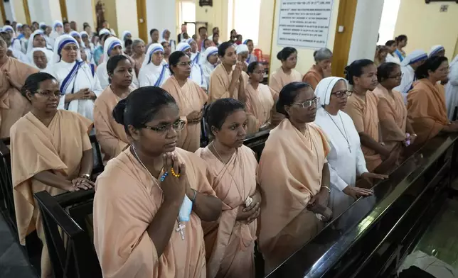 Catholic nuns attend a service for the late Pope Francis at the Cathedral of The Most Holy Rosary, in Kolkata, India, Saturday, April 26, 2025. (AP Photo/Bikas Das)