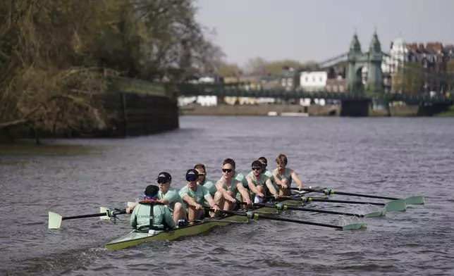 The Cambridge University Men's Boat Team during a training session on the River Thames in London, Tuesday, April 8, 2025. (Zac Goodwin/PA via AP)