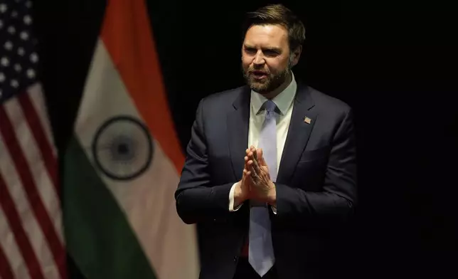 U.S. Vice President JD Vance greets the audience after speaking at the Rajasthan International Center in Jaipur, India, Tuesday, April 22, 2025. (AP Photo/Manish Swarup)