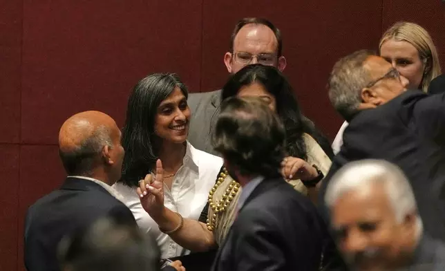 U.S. Vice President JD Vance's wife Usha Vance, second left, talks to invitees after a speech by her husband at the Rajasthan International Center in Jaipur, India, Tuesday, April 22, 2025. (AP Photo/Manish Swarup)