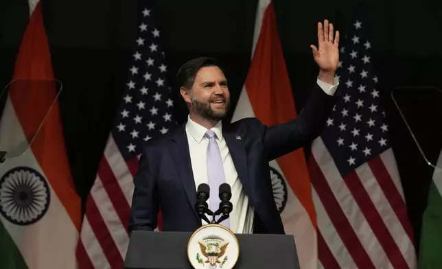 U.S. Vice President JD Vance waves at the audience after speaking at the Rajasthan International Center in Jaipur, India, Tuesday, April 22, 2025. (AP Photo/Manish Swarup)