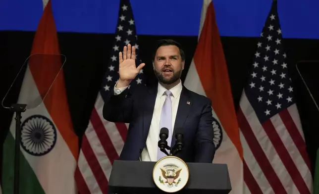 U.S. Vice President JD Vance waves at the audience after speaking at the Rajasthan International Center in Jaipur, India, Tuesday, April 22, 2025. (AP Photo/Manish Swarup)