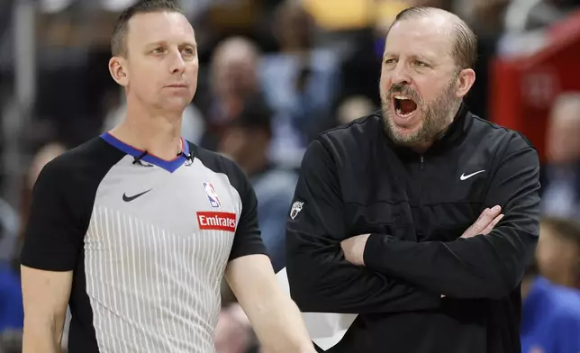 New York Knicks head coach Tom Thibodeau, right, yells at referee Justin Van Duyne, left, during the second half of an NBA basketball game against the Detroit Pistons, Thursday, April 10, 2025, in Detroit. (AP Photo/Duane Burleson)