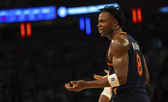 New York Knicks forward OG Anunoby (8) reacts after a referee call during the first half of Game 2 of an NBA basketball first-round playoff series against the Detroit Pistons, Monday, April 21, 2025, in New York. (AP Photo/Angelina Katsanis)