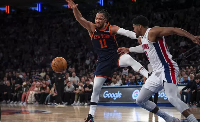 New York Knicks guard Jalen Brunson (11) loses control of the ball during the second half of Game 2 of an NBA basketball first-round playoff series against the Detroit Pistons, Monday, April 21, 2025, in New York. (AP Photo/Angelina Katsanis)