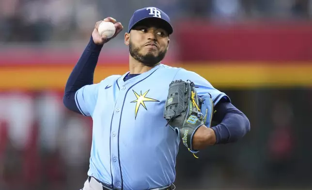 Tampa Bay Rays starting pitcher Taj Bradley throws against the Arizona Diamondbacks during the first inning of a baseball game Wednesday, April 23, 2025, in Phoenix. (AP Photo/Ross D. Franklin)