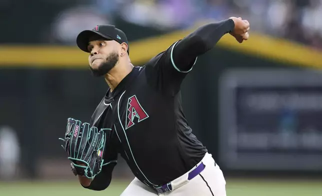 Arizona Diamondbacks starting pitcher Eduardo Rodriguez throws against the Tampa Bay Rays during the first inning of a baseball game Wednesday, April 23, 2025, in Phoenix. (AP Photo/Ross D. Franklin)