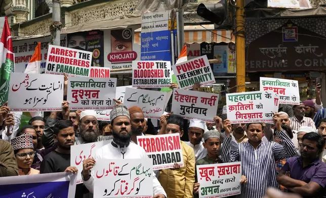 Muslims shout slogans after Friday prayers during a protest organized by Raza Academy against the killing of tourists by militants near Pahalgam in Indian controlled Kashmir in Mumbai, India, Friday, April. 25, 2025.(AP Photo/Rajanish Kakade)