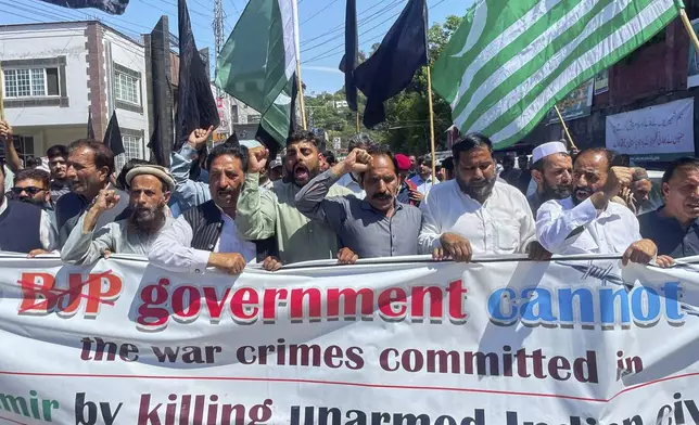 Members of Kashmiri refugee organization "Pasban-e-Hurriya" chant slogans during a demonstration to denounce the suspension of the water sharing treaty by India, in Muzaffarabad, the capital of Pakistan-administered Kashmir, Friday, April 25, 2025. (AP Photo/M.D. Mughal)