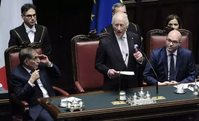 Britain's King Charles III, center, flanked by Ignazio LaRussa, President of the Italian Senate, left, and Lorenzo Fontana, President of the Italian Chamber of Deputies, addresses the Italian Chamber of Deputies in Rome, Wednesday, April 9, 2025. (Mauro Scrobogna/LaPresse via AP)
