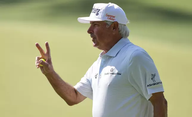 Fred Couples waves after making a putt on the sixth hole during the first round at the Masters golf tournament, Thursday, April 10, 2025, in Augusta, Ga. (AP Photo/Matt Slocum)