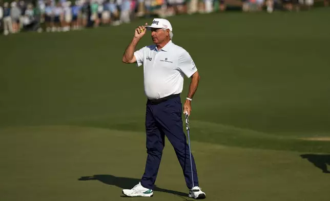 Fred Couples waves after making a putt on the second hole during the first round at the Masters golf tournament, Thursday, April 10, 2025, in Augusta, Ga. (AP Photo/George Walker IV)