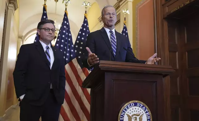Speaker of the House Mike Johnson, R-La., left, and Senate Majority Leader John Thune, R-S.D., make statements to reporters ahead of vote in the House to pass a bill on President Donald Trump's top domestic priorities of spending reductions and tax breaks, at the Capitol in Washington, Thursday, April 10, 2025. (AP Photo/J. Scott Applewhite)