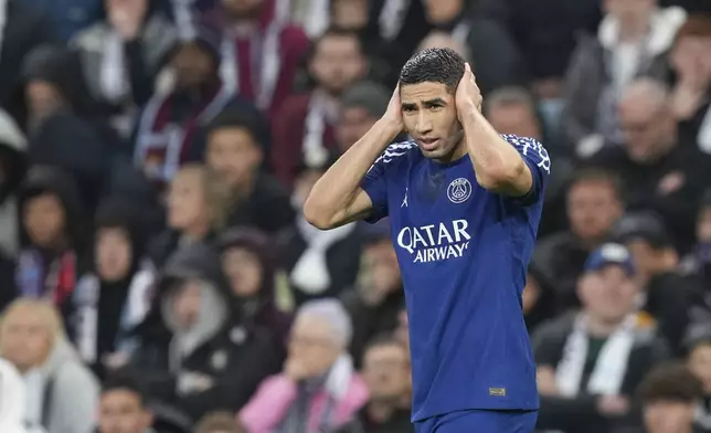 PSG's Achraf Hakimi celebrates after scoring his side's first goal during the Champions League quarterfinal second leg soccer match between Aston Villa and Paris Saint-Germain at the Villa Park stadium, in Birmingham, England, Tuesday, April 15, 2025. (AP Photo/Frank Augstein)