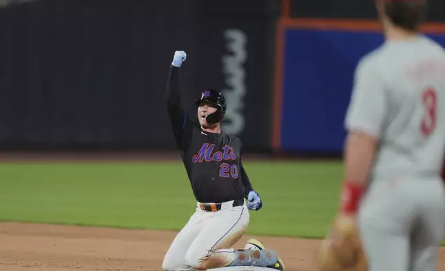 New York Mets' Pete Alonso celebrates after hitting an RBI double during the seventh inning of a baseball game against the Philadelphia Phillies Tuesday, April 22, 2025, in New York. (AP Photo/Frank Franklin II)