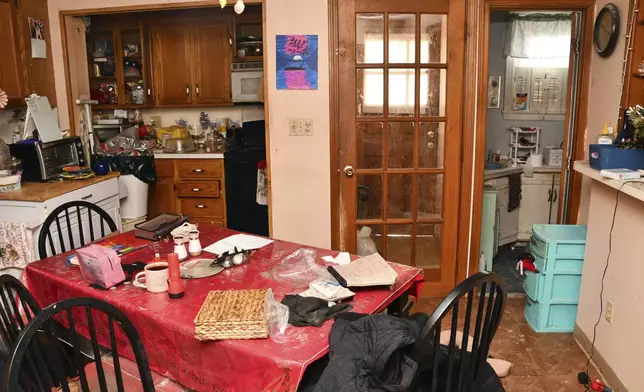 This image provided by the Waterbury Police Department shows the home where a Connecticut man told authorities his stepmother held him captive for two decades since he was a boy. (Waterbury Police Department via AP)
