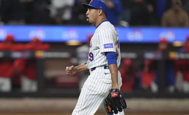 New York Mets pitcher Edwin Díaz reacts after a baseball game against the Philadelphia Phillies Monday, April 21, 2025, in New York. (AP Photo/Frank Franklin II)