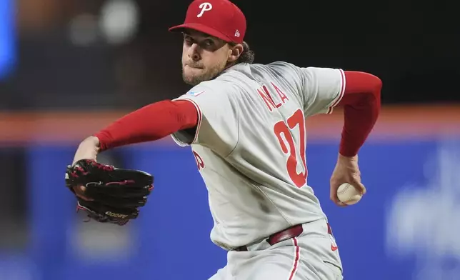 Philadelphia Phillies' Aaron Nola pitches during the second inning of a baseball game against the New York Mets Monday, April 21, 2025, in New York. (AP Photo/Frank Franklin II)