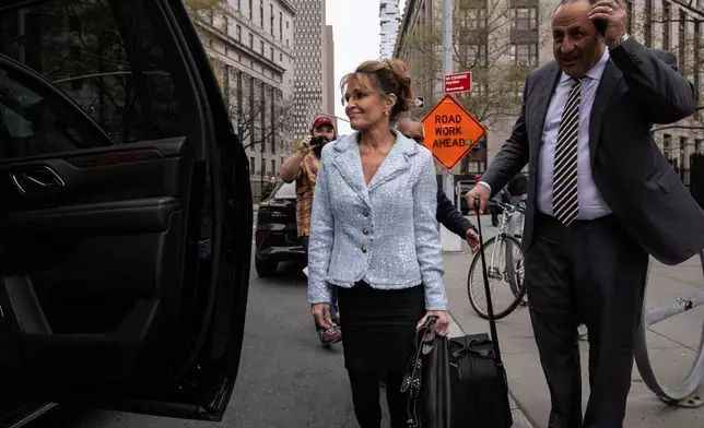 Former Alaska Gov. Sarah Palin leaves Manhattan federal court, after testifying in her defamation trial against the New York Times, Monday, April 21, 2025, in New York. (AP Photo/Yuki Iwamura)