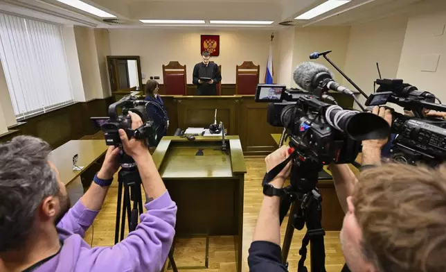 Russia's Supreme Court judge Oleg Nefyodov delivers a verdict lifting a ban on Afghanistan's Taliban, who were designated as a terrorist group more than two decades ago, in Moscow, Russia, Thursday, April 17, 2025. (AP Photo/Dmitry Serebryakov)