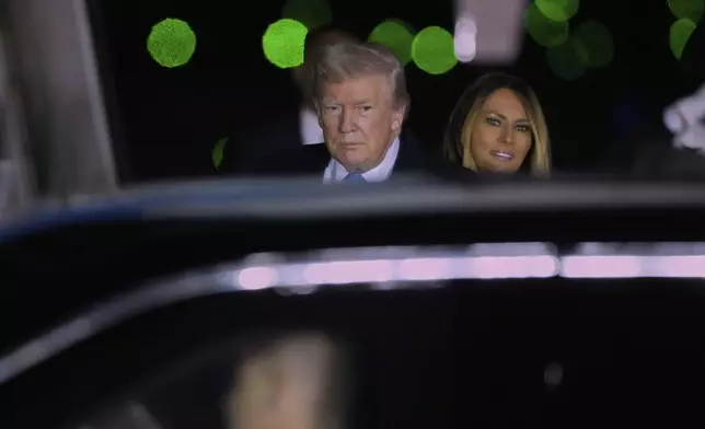 CORRECTS DATE TO APRIL 25 - President Donald Trump and first lady Melania Trump arrive on Air Force One at Rome's Leonardo da Vinci International airport in Fiumicino, Friday, April 25, 2025, to attend the funeral for Pope Francis at the Vatican. (AP Photo/Markus Schreiber)